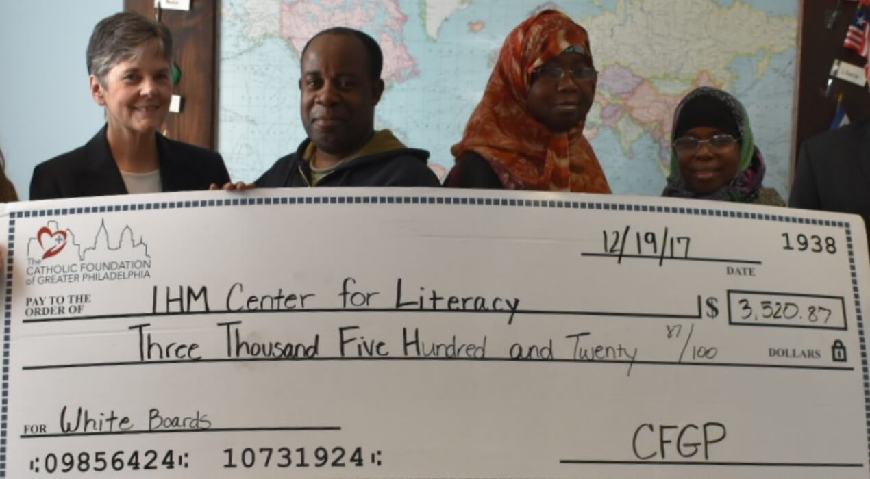 IHM Center for Literacy receiving their CFGP grant